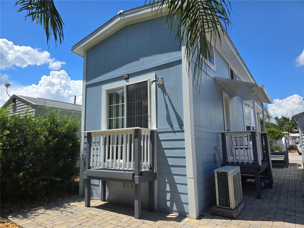 20285 Highway 27, Unit 38 Clermont, FL 34715 - Photo 23 of 33 a view of a house with a yard