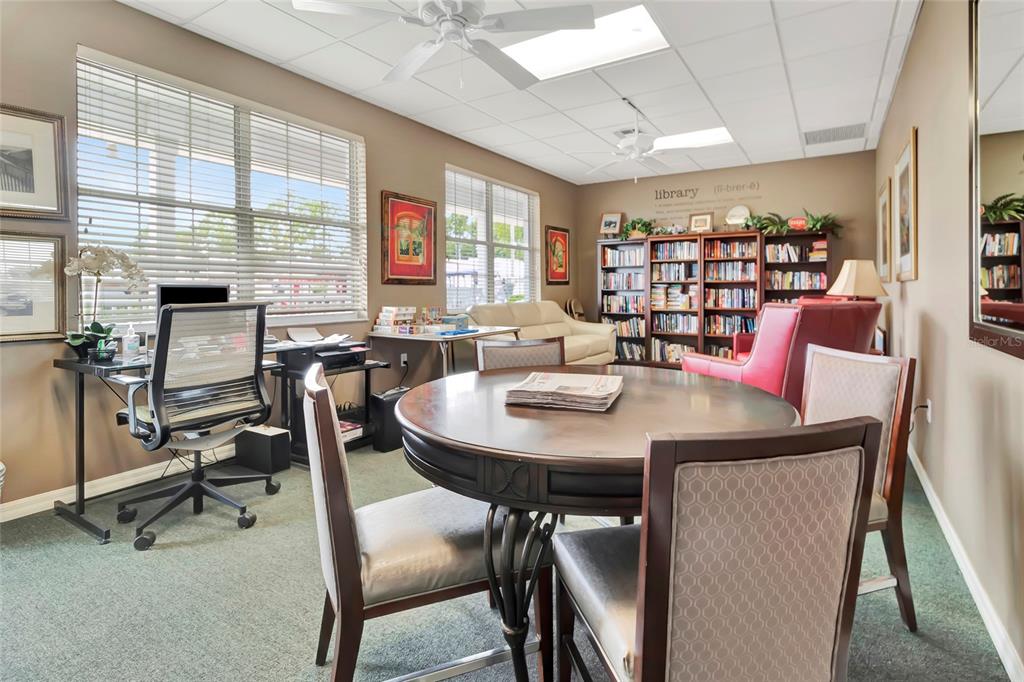 20285 Highway 27, Unit 38 Clermont, FL 34715 - Photo 29 of 33 a view of a dining room with furniture and a window