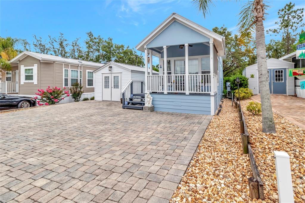 20285 Highway 27, Unit 38 Clermont, FL 34715 - Photo 4 of 33 front view of a house with a yard
