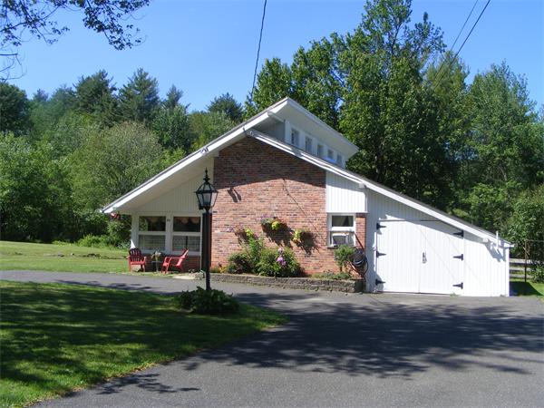 84 North Farms Road Northampton, MA 01062 - Photo 2 of 10 a aerial view of a house with a yard
