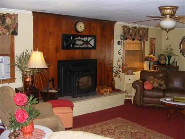 84 North Farms Road Northampton, MA 01062 - Photo 4 of 10 a living room with furniture and a fireplace