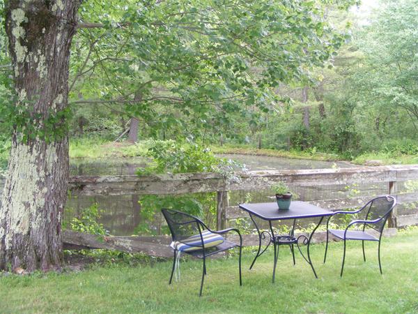 84 North Farms Road Northampton, MA 01062 - Photo 9 of 10 a patio with glass top table and chairs