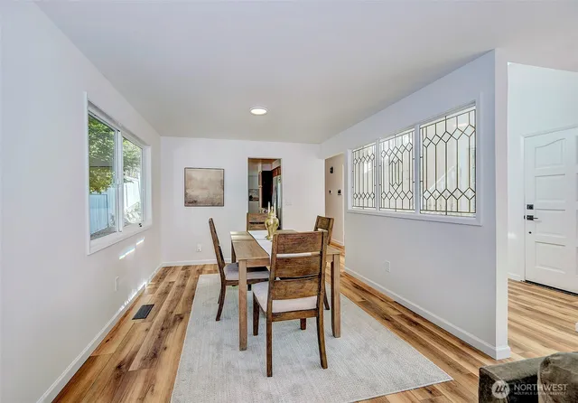 a workspace with furniture and a window