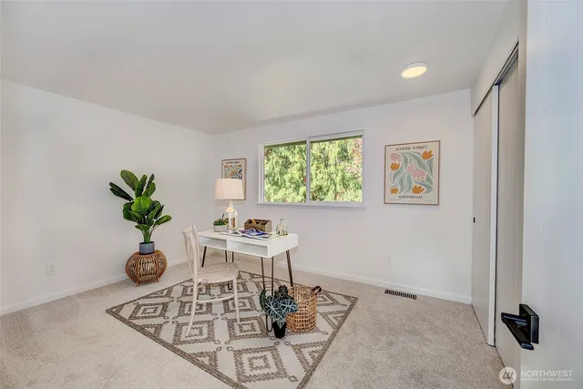 a vase of flowers sitting on a table