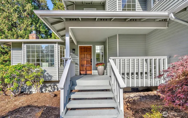 a view of a balcony with a potted plant