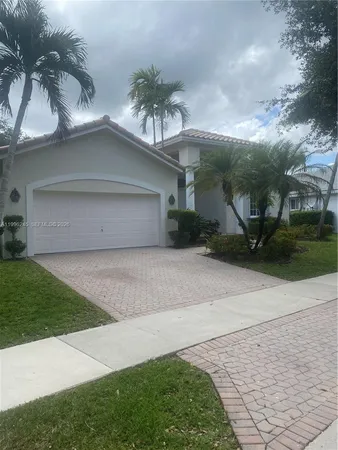 a front view of house with yard