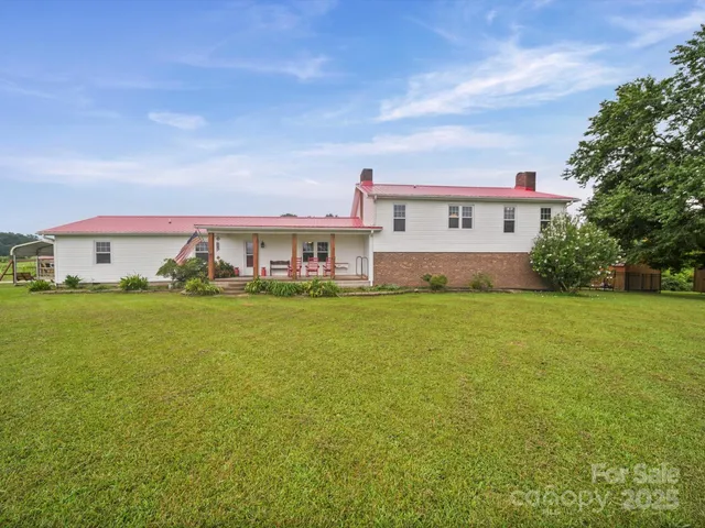 a front view of house with an outdoor space and seating