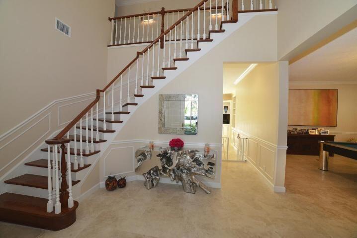 6167 Northwest 23rd Way Boca Raton, FL 33496 - Photo 13 of 28 a view of entryway and hall