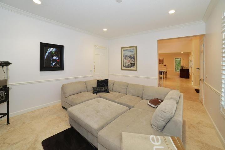 6167 Northwest 23rd Way Boca Raton, FL 33496 - Photo 15 of 28 a living room with furniture and a wall painting