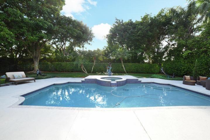 6167 Northwest 23rd Way Boca Raton, FL 33496 - Photo 26 of 28 a view of a swimming pool with a sitting area