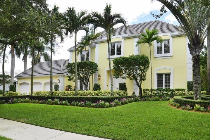 6167 Northwest 23rd Way Boca Raton, FL 33496 - Photo 3 of 28 a front view of house with yard and green space