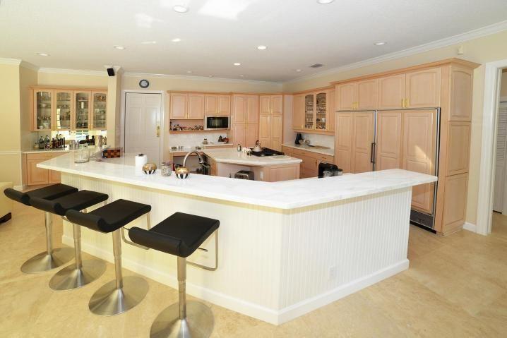 6167 Northwest 23rd Way Boca Raton, FL 33496 - Photo 8 of 28 a room with table chairs and white stainless steel appliances