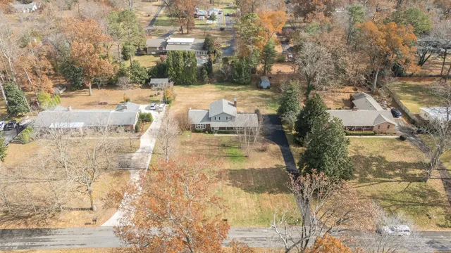 a view of a yard with an outdoor space
