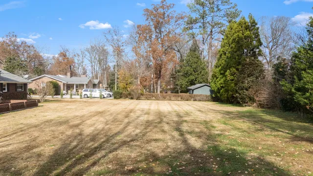 a view of road with trees