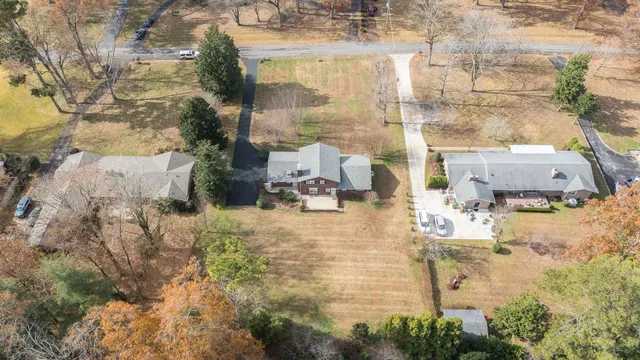 a view of yard along with trees