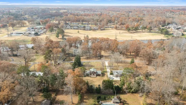 a view of a lake with a yard