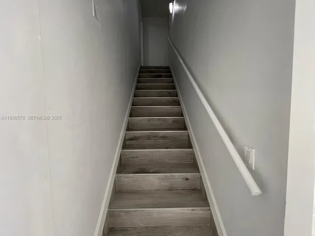 a view of hallway with shower