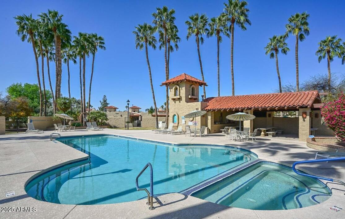 16623 North 29th Drive Phoenix, AZ 85053 - Photo 2 of 13 a view of a swimming pool with a patio