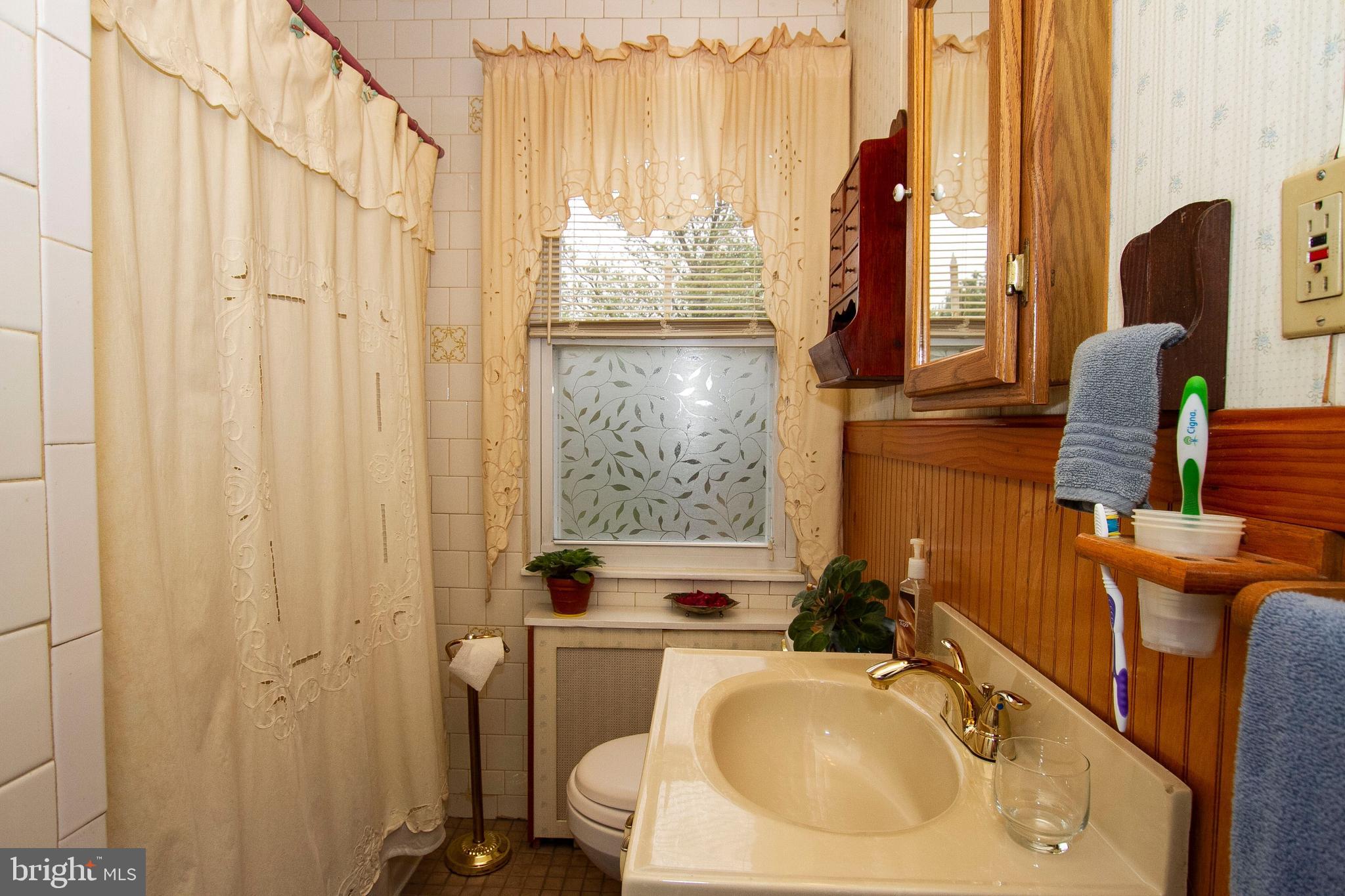 1727 Pin Oak Road Baltimore, MD 21234 - Photo 14 of 26 FULL BATH WITH WARM RADIATOR HEAT