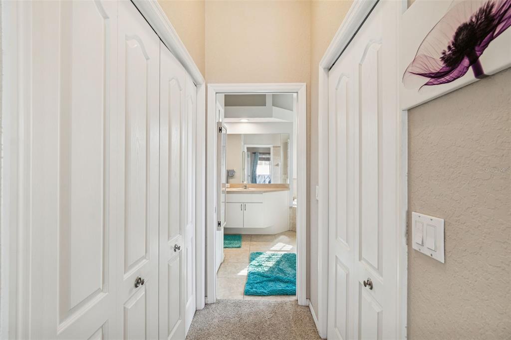5287 Slater Road Spring Hill, FL 34608 - Photo 30 of 86 a view of a bathroom from a hallway