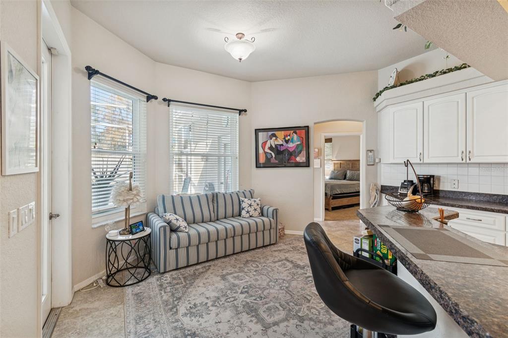 5287 Slater Road Spring Hill, FL 34608 - Photo 50 of 86 a living room with furniture and a window