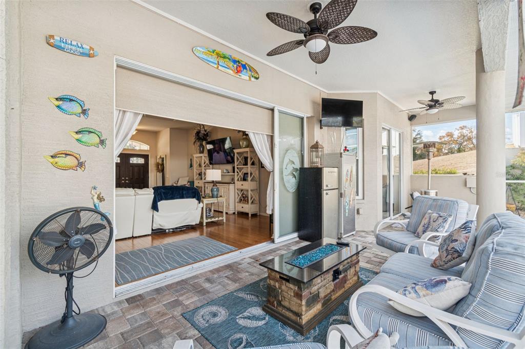 5287 Slater Road Spring Hill, FL 34608 - Photo 57 of 86 a living room with furniture a rug and a window