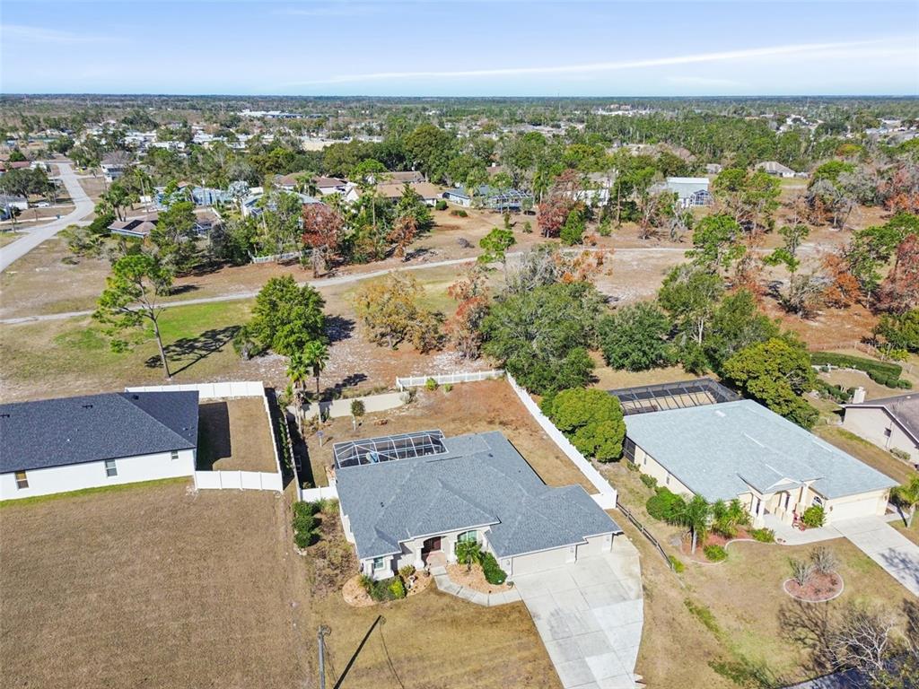 5287 Slater Road Spring Hill, FL 34608 - Photo 75 of 86 an aerial view of a house with a yard