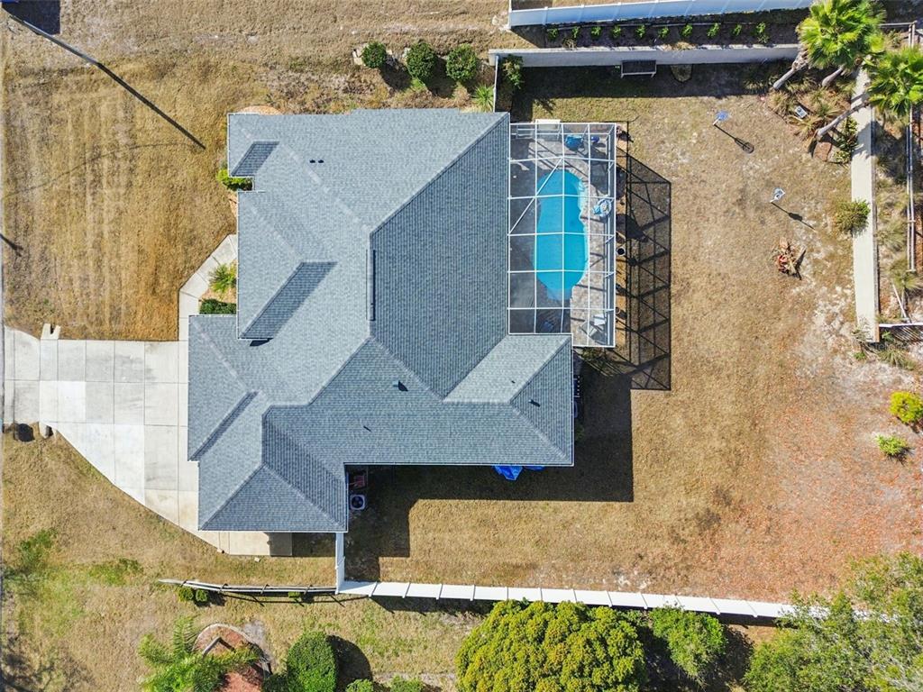5287 Slater Road Spring Hill, FL 34608 - Photo 78 of 86 an aerial view of a house with a yard