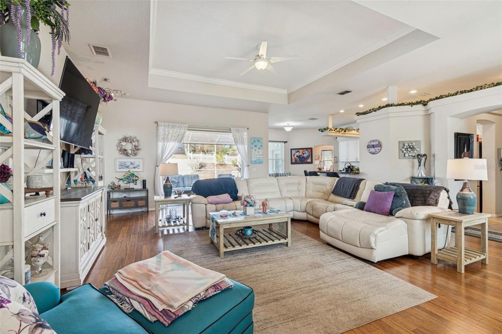 5287 Slater Road Spring Hill, FL 34608 - Photo 8 of 86 a living room with furniture and a rug