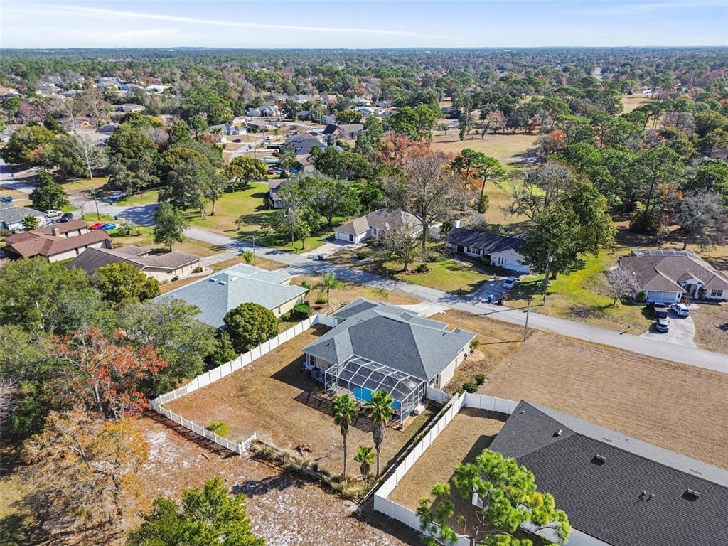 5287 Slater Road Spring Hill, FL 34608 - Photo 81 of 86 an aerial view of a house with a mountain