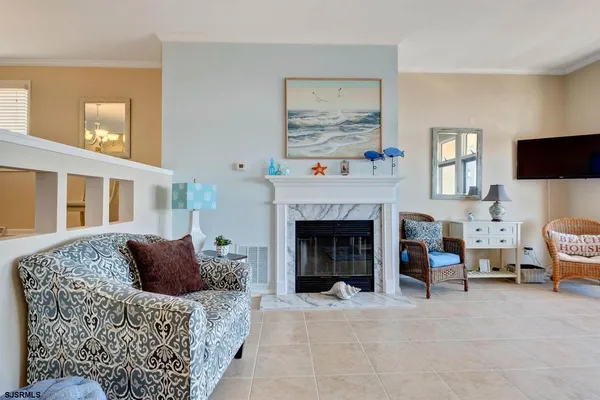 a bed room with furniture and a fireplace