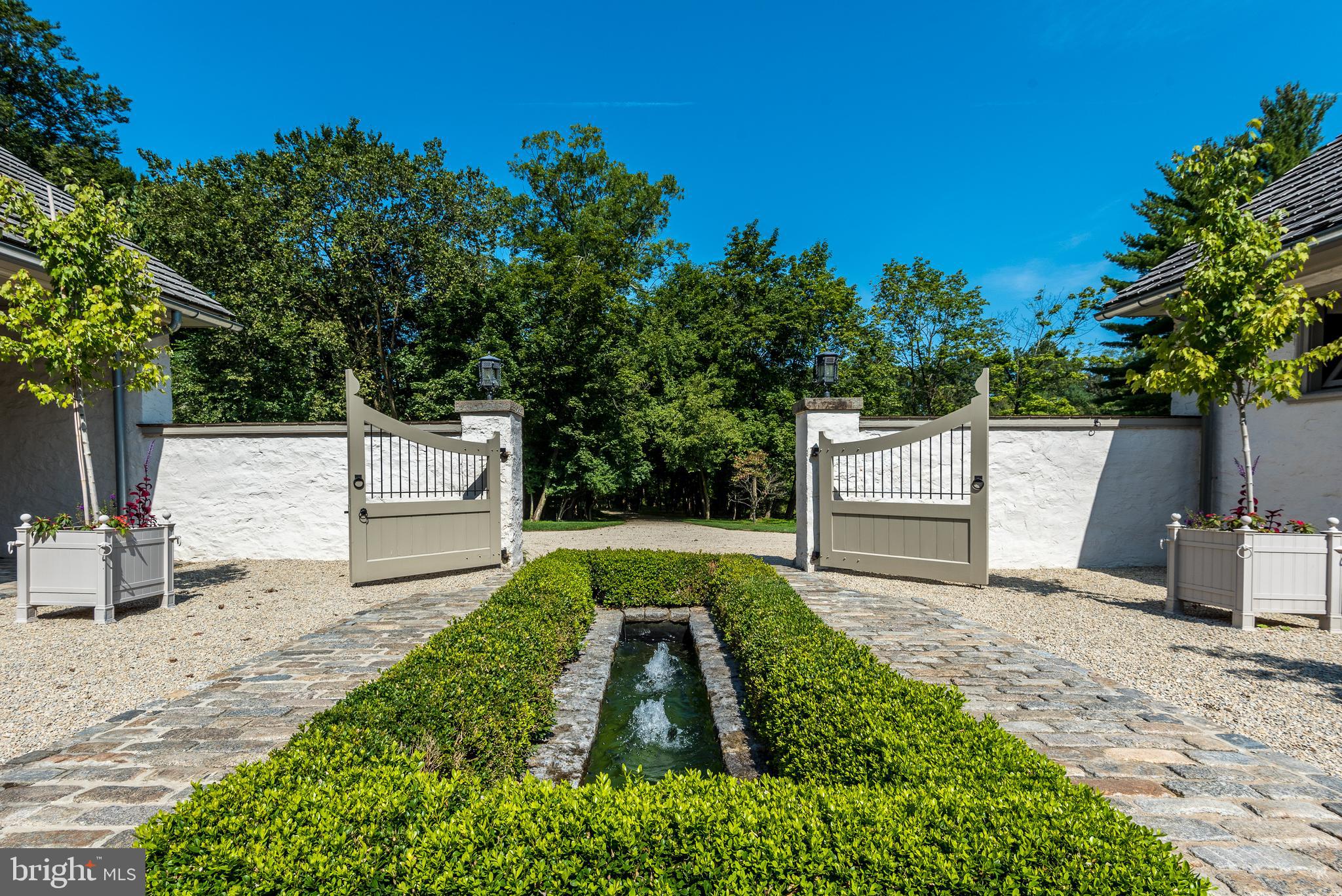 1320 Gypsy Hill Road Ambler, PA 19002 - Photo 11 of 66 Courtyard fountain- view from front door