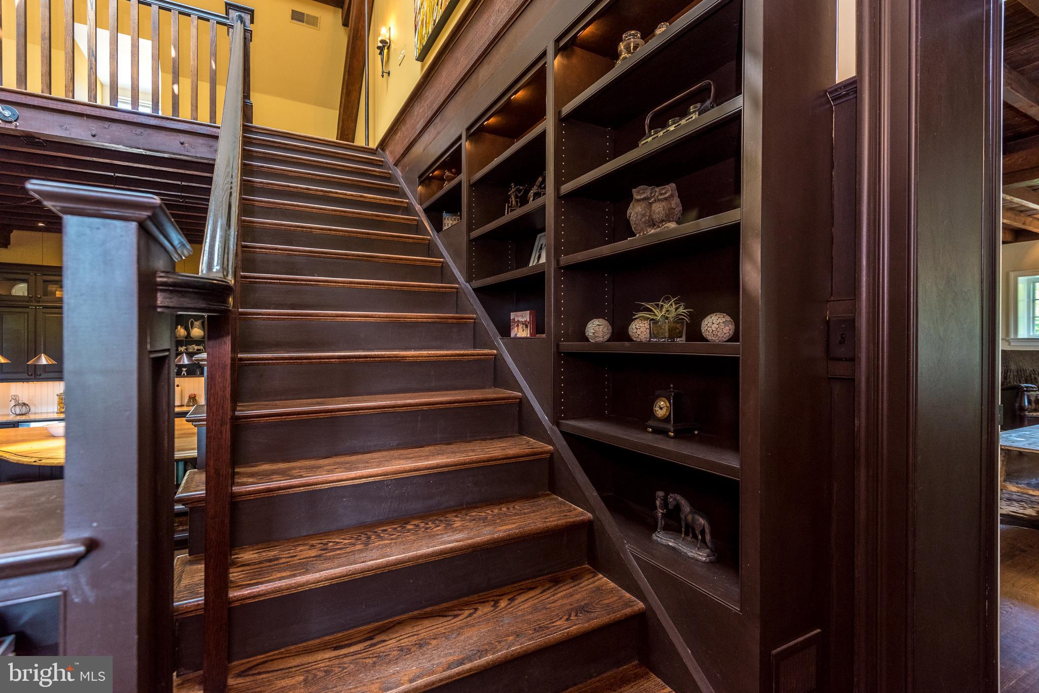 1320 Gypsy Hill Road Ambler, PA 19002 - Photo 42 of 66 Main Staircase w/custom bookshelves