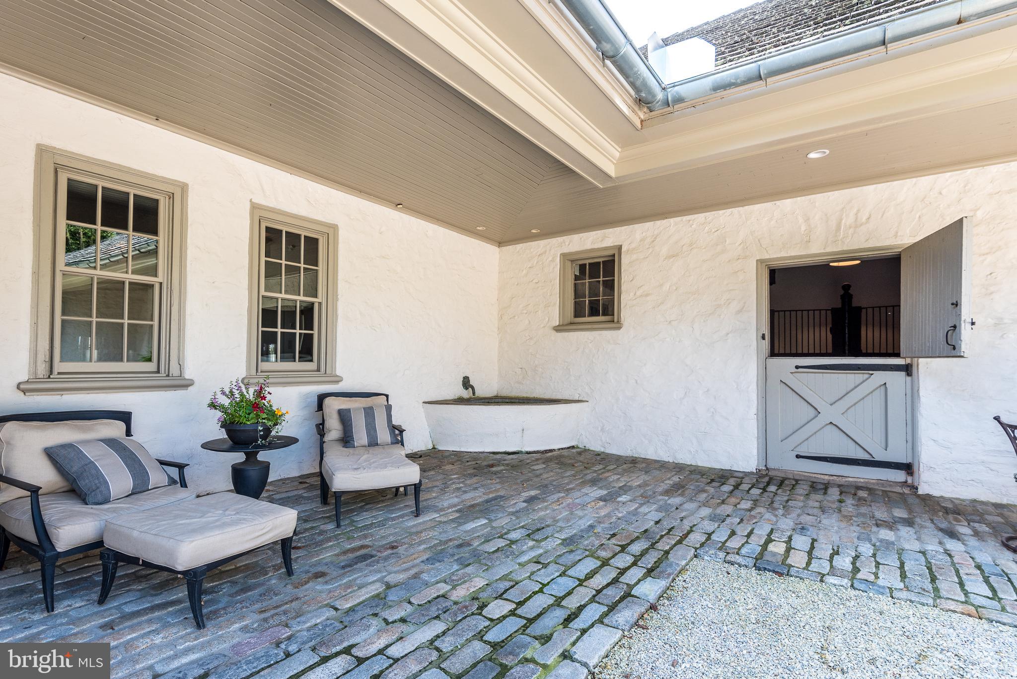 1320 Gypsy Hill Road Ambler, PA 19002 - Photo 10 of 66 Courtyard Patio with open Barn Stall Door