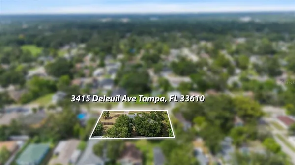 an aerial view of a city with lots of residential buildings