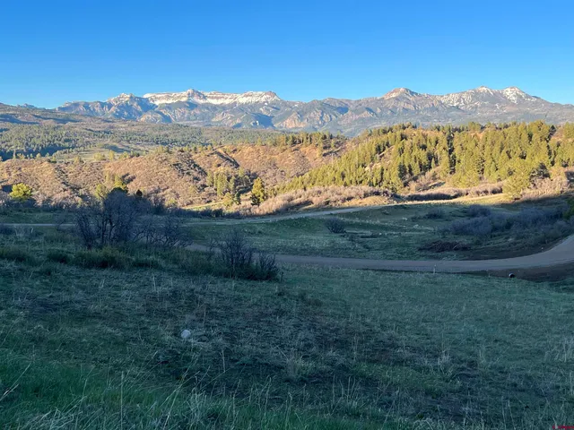 a view of mountain with lake view