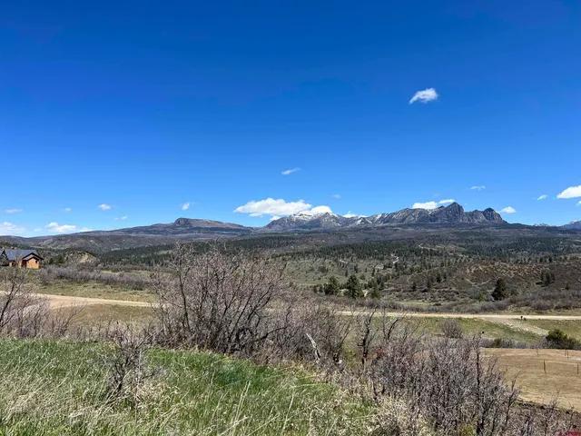 a view of a lake with a mountain