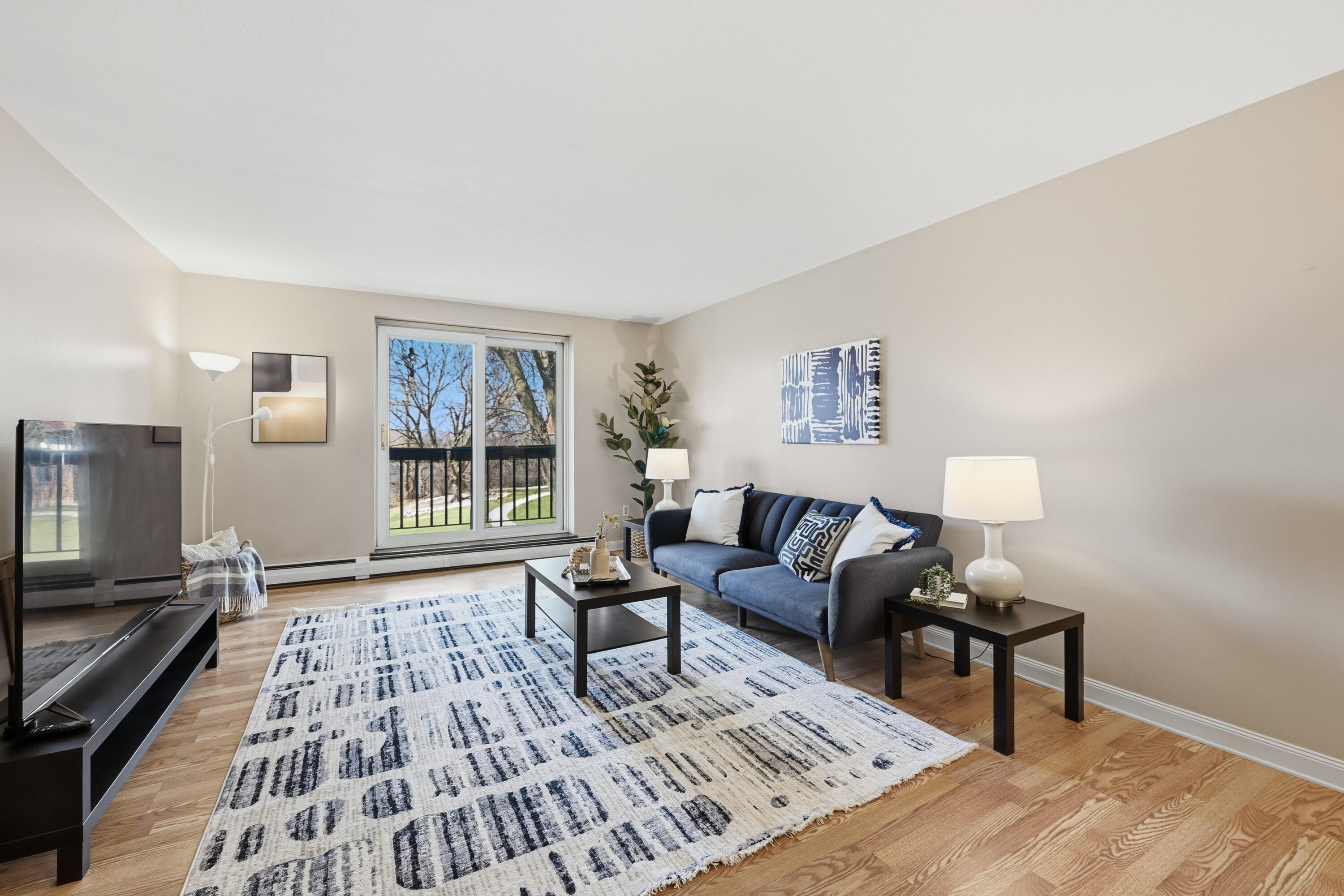 5253 North Lovers Lane Road, Unit 223 Milwaukee, WI 53225 - Photo 6 of 33 Sliding door to balcony