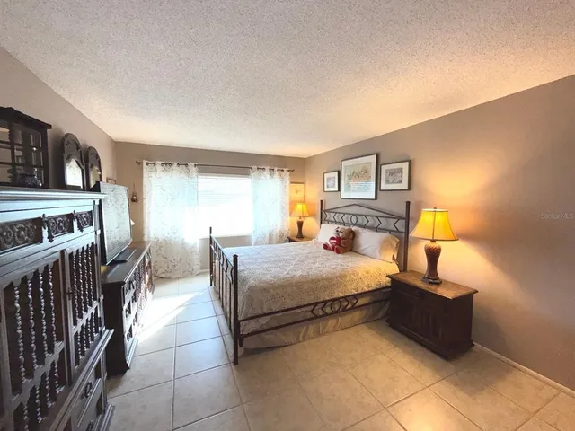 $349,900 | 100 Bluff View Drive, Unit 415A, Belleair Bluffs, FL 33770