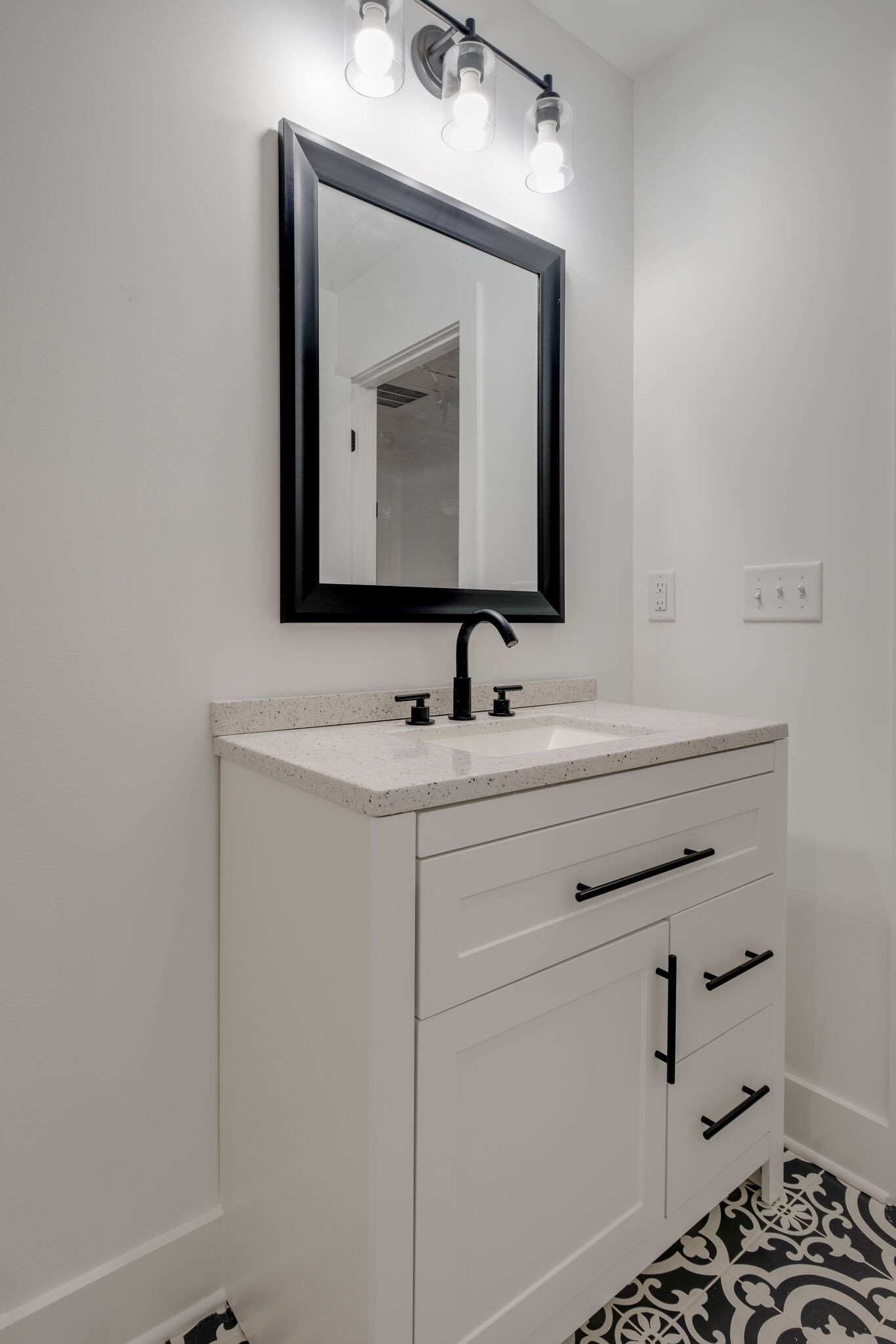 111 Sanitarium Road, Unit A Madison, TN 37115 - Photo 24 of 31 a bathroom with a sink vanity and mirror