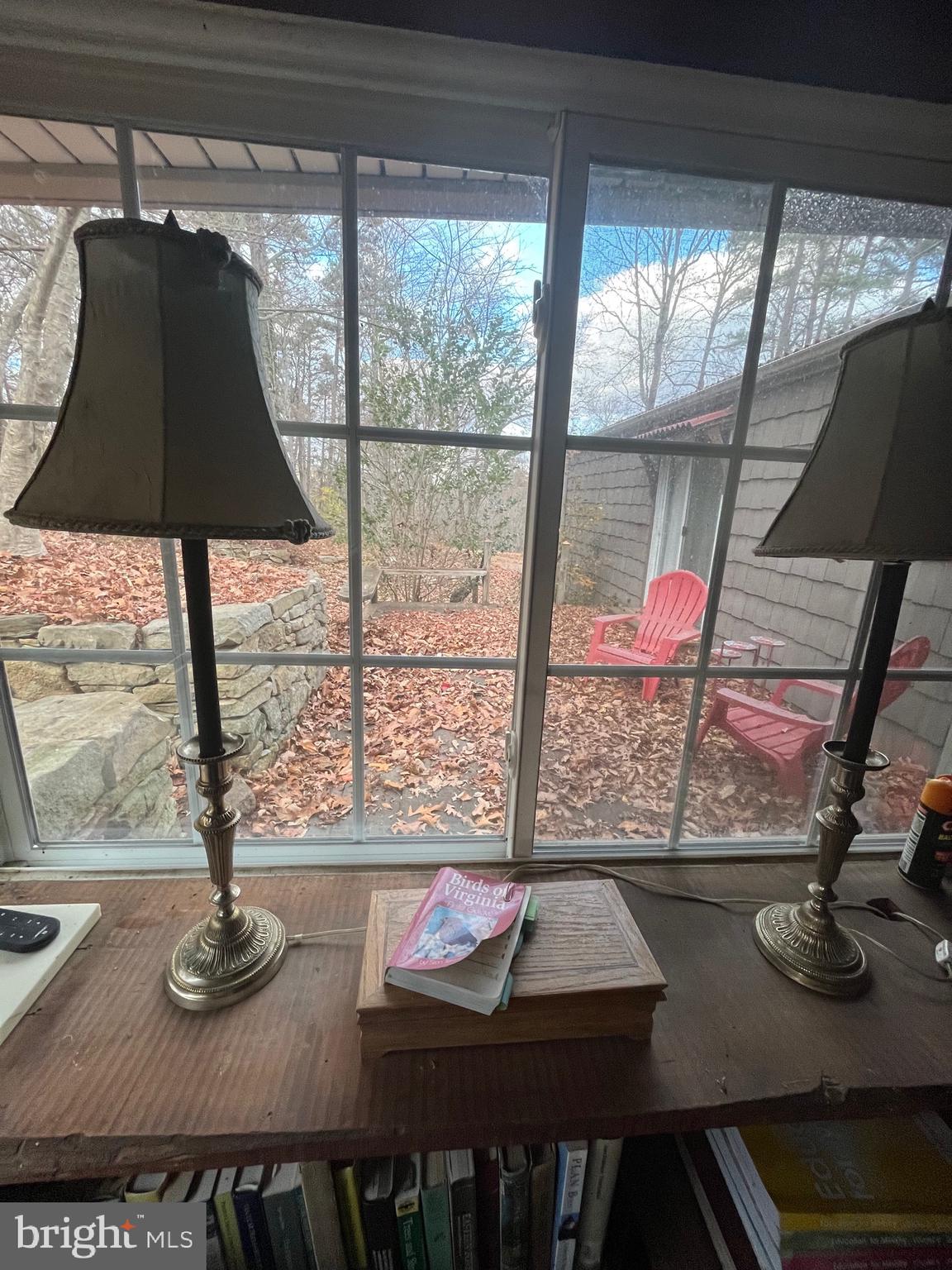 59 Angel Kiss Lane Castleton, VA 22716 - Photo 16 of 18 a view of a dining room with furniture and floor to ceiling window