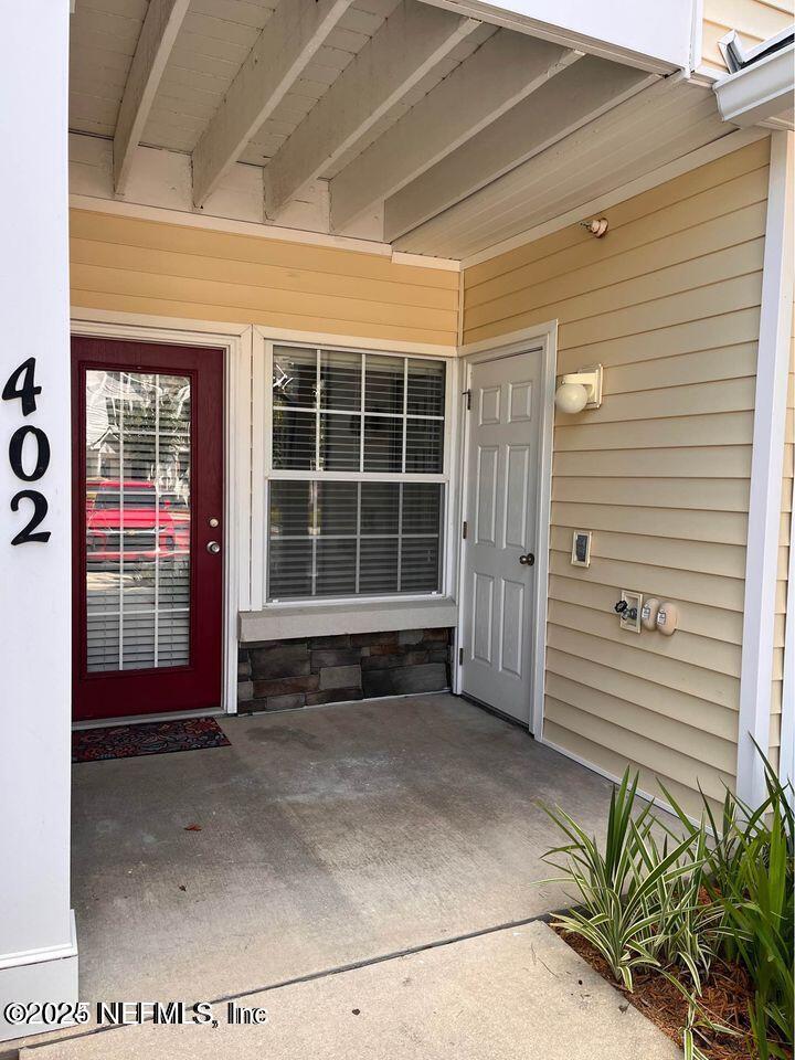 2200 Marsh Hawk Lane, Unit 402 Fleming Island, FL 32003 - Photo 1 of 8 Front porch