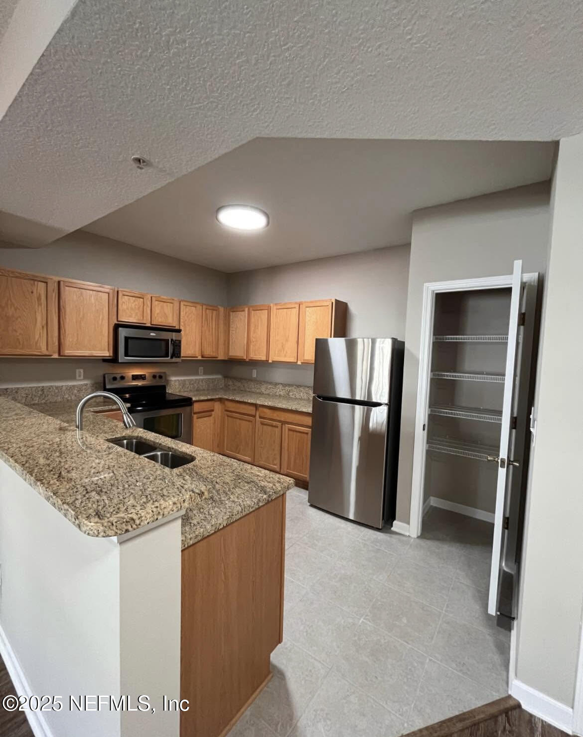 2200 Marsh Hawk Lane, Unit 402 Fleming Island, FL 32003 - Photo 4 of 8 6F6CB01F-BADD-486A-B56A-660D198407D7