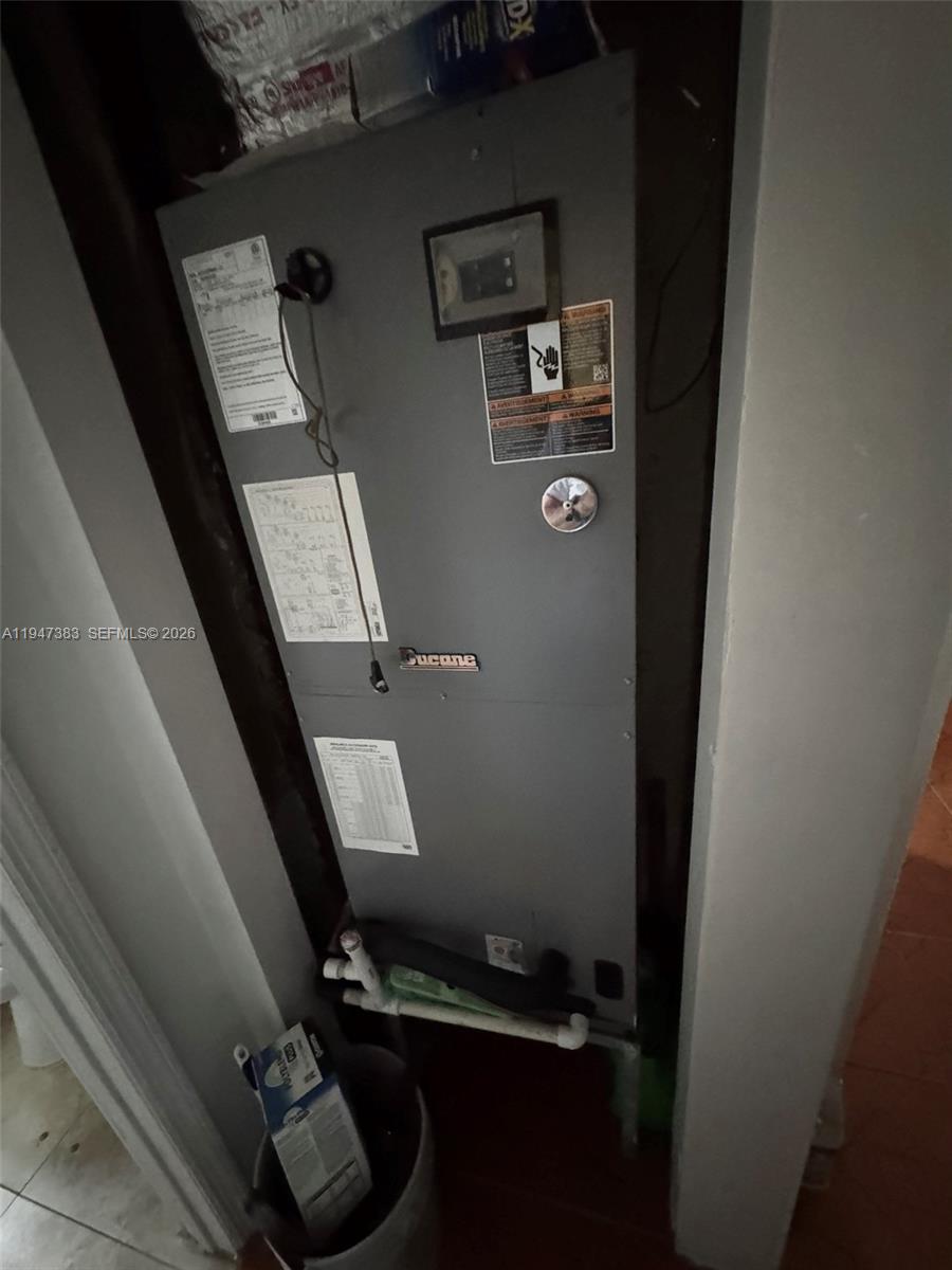 790 Northwest 76th Street Miami, FL 33150 - Photo 5 of 10 a view of water heater