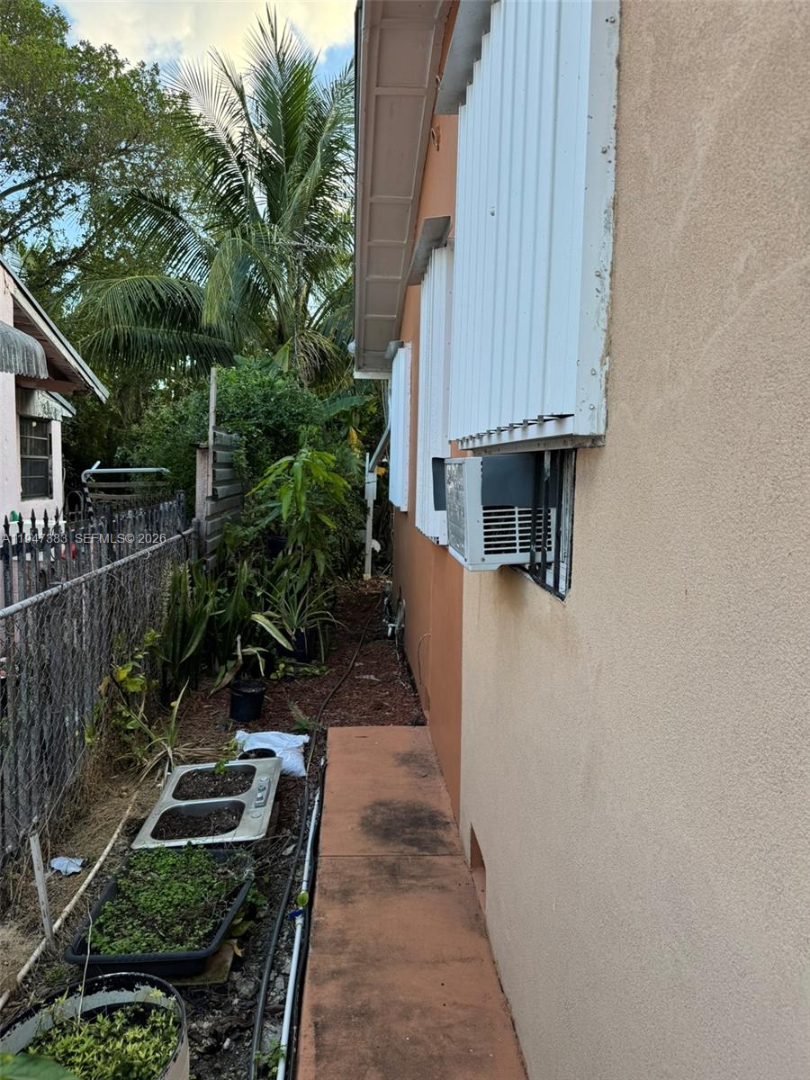 790 Northwest 76th Street Miami, FL 33150 - Photo 10 of 10 an outdoor view of house with backyard