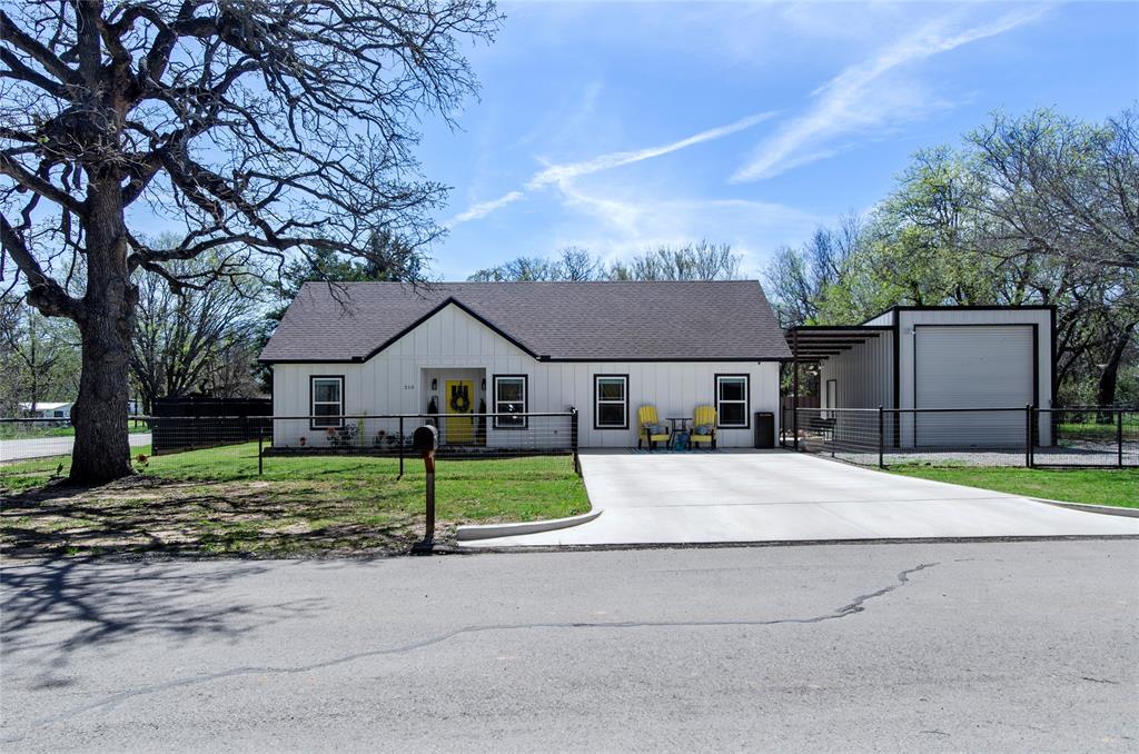 Corner lot surrounded by trees in a walkable community!