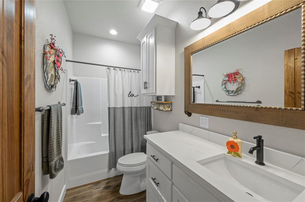 210 Stevens Street Bridgeport, TX 76426 - Photo 18 of 31 Master bath has plenty of counter space, under mount sink and beautiful fixtures!
