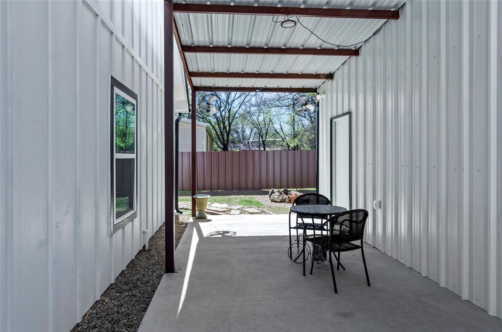 210 Stevens Street Bridgeport, TX 76426 - Photo 25 of 31 Tandem carport doubles as a breeze way patio!