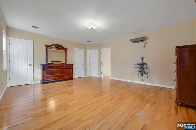 a view of a room with racks on the wall