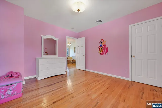 a room with a bed and a window